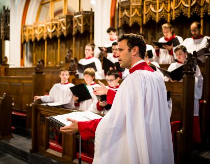 Founder and Director Nick Halley leading the choir in an Evensong, 2017.